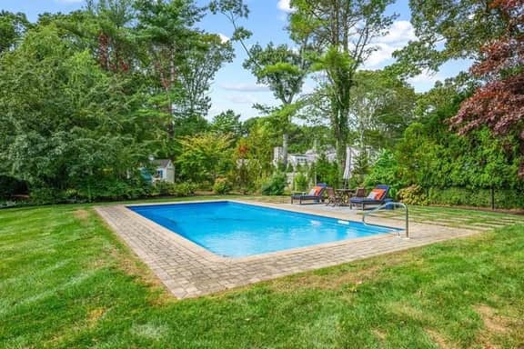 Classic Cape with heated pool and lovely landscaped yard! RPMS004 - Image 2