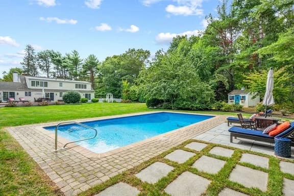 Classic Cape with heated pool and lovely landscaped yard! RPMS004 - Image 1